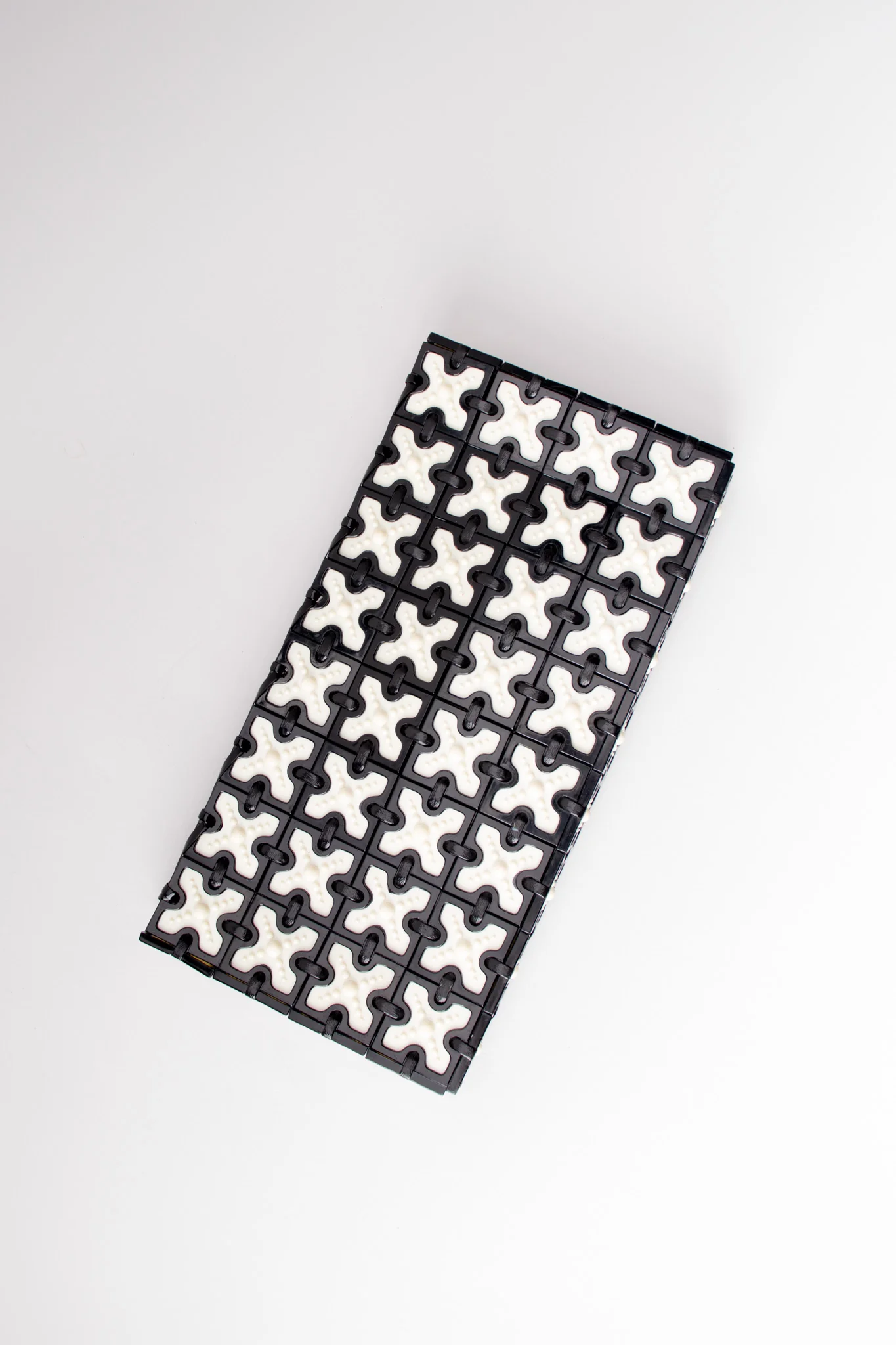 Cross Tile Clutch