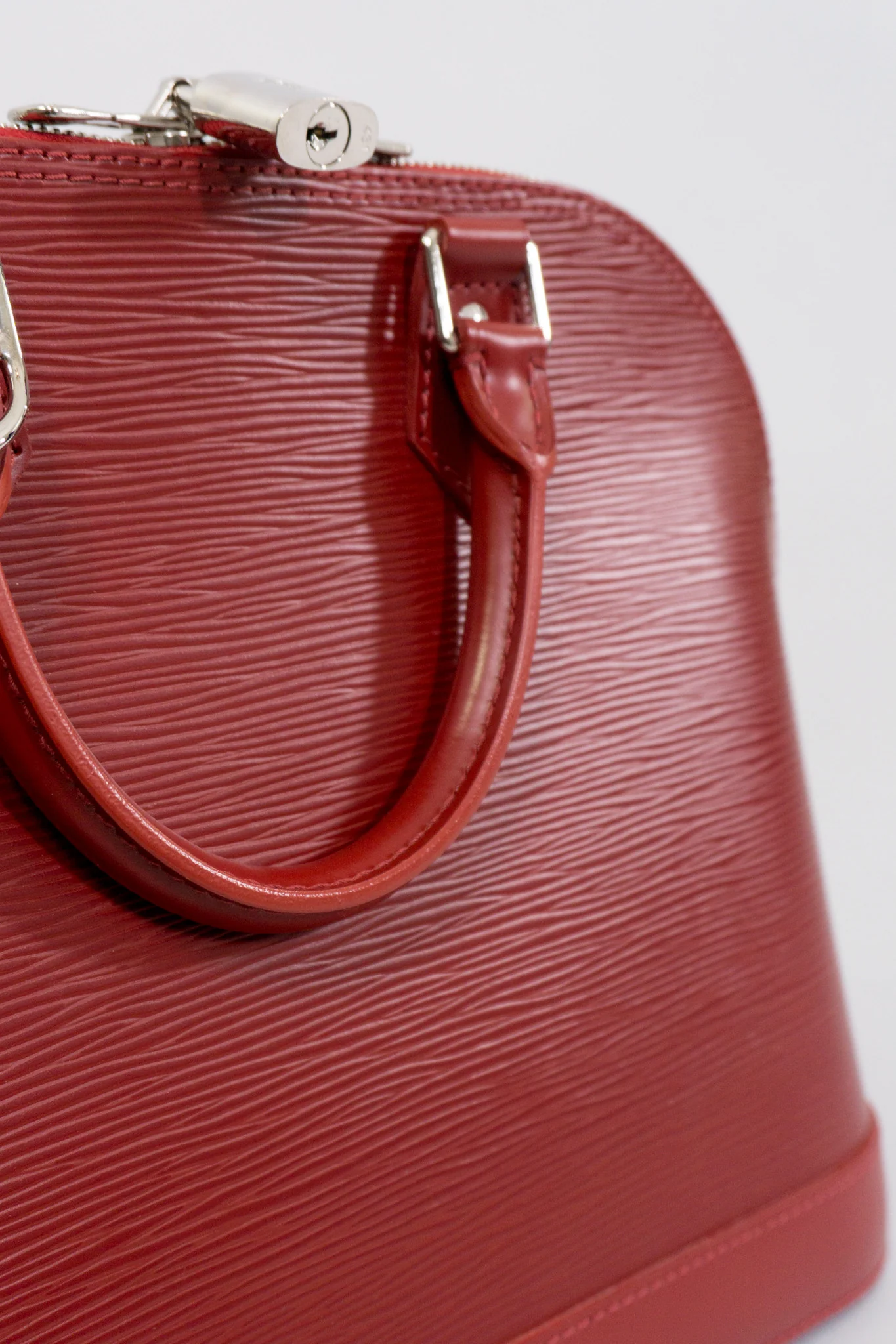 Epi Alma NM Handbag - Image 10