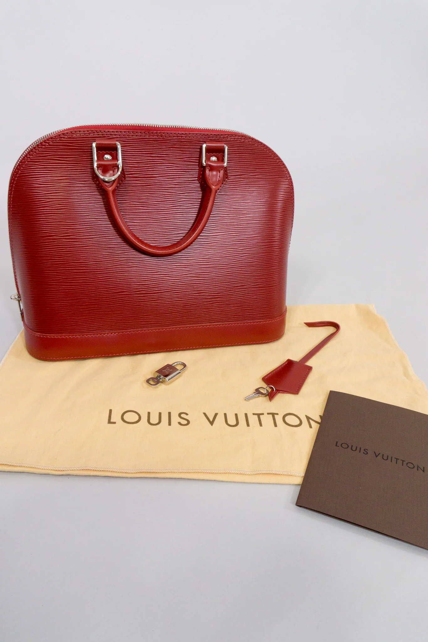 Epi Alma NM Handbag - Image 15